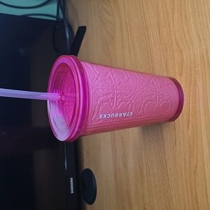 Starbucks 16 oz opaque pink tumbler with an Embossed Floral Design